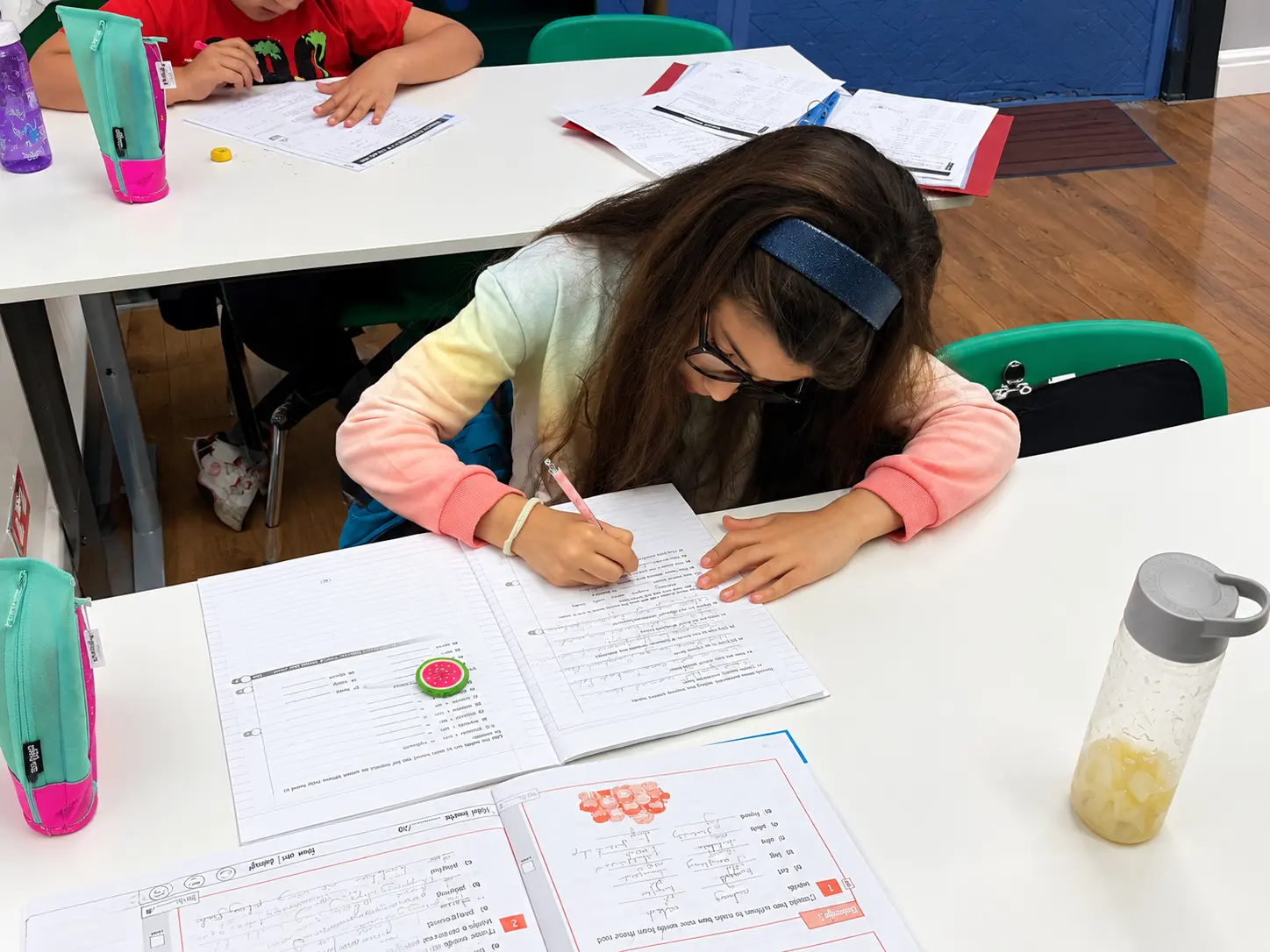 Workbooks, practice papers and learning materials used in lessons